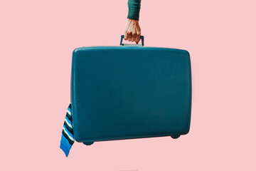 man carrying a blue suitcase