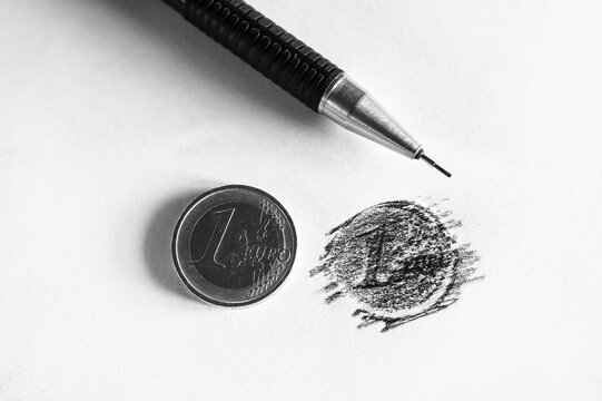 Retrace Euro coin with pencil