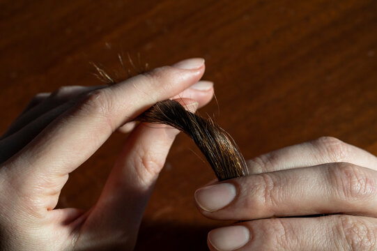 Woman touching her hair