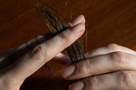 Woman touching her hair