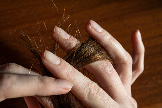 Woman touching her hair