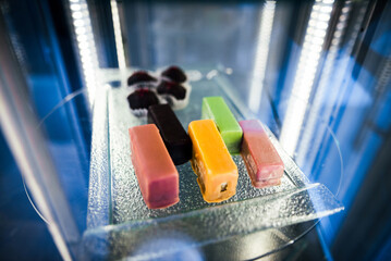 Cakes on a display case at café 