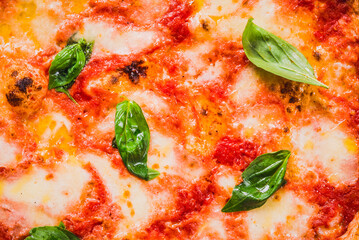 Pizza delivery food background italian Margherita with mozzarella, basil and tomato sauce close up background.