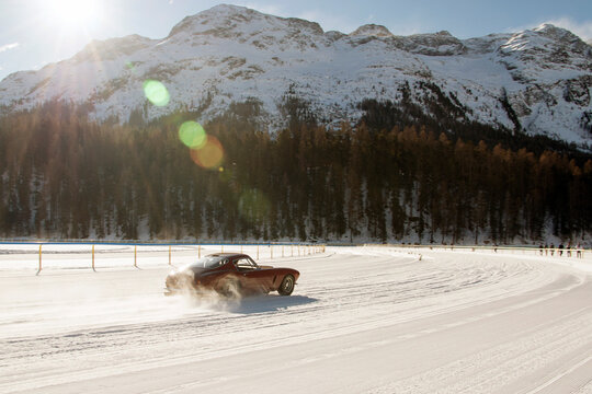Vintage sports car on the frozen lake of St moritz