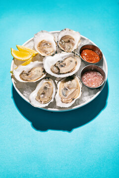 Half Dozen Freshly Shucked Oysters On Ice