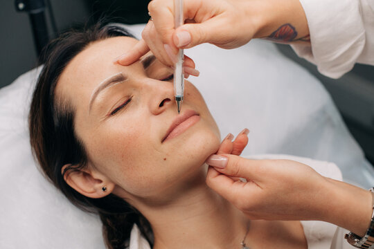 Eyebrows and lips permanent makeup process