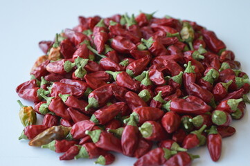 a bunch of little extremely hot red chili peppers