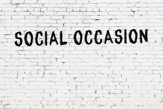 Inscription Social Occasion Painted On White Brick Wall