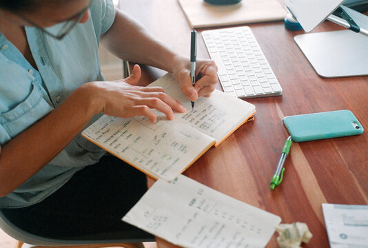 Working at home writing notes