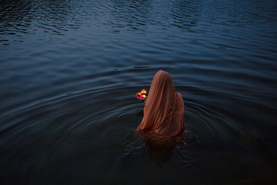 Prayer In The Betwa River, Orchha