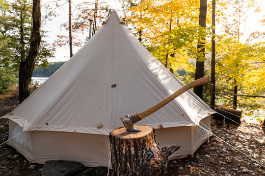 Rustic Axe and Canvas Tent Autumn Canoe Trip with Fall Forest