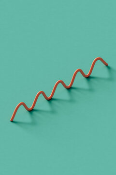 Pink curved wire on blue. 3d render