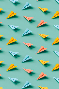 a pattern of paper planes in different positions