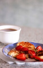 Closeup pancakes with strawberries food eat delicious sweet dessert bakery tasty pastry nobody sugar cup table 