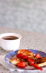 Closeup pancakes with strawberries and cup of coffee food sweet dessert breakfast cappuccino latte espresso morning bakery tasty nobody plate caffeine cafe kitchen table hot drink beverage photography