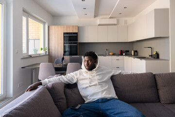 Man On Couch At Living Room
