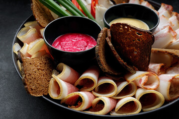 Ukrainian appetizer, lard, bacon, horseradish, mustard, onion and rye bread