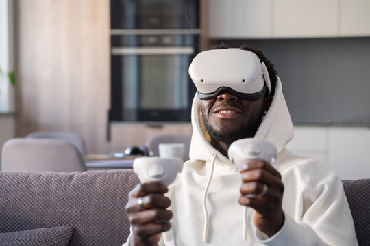 Excited Man Using 3D Virtual Glasses At Home