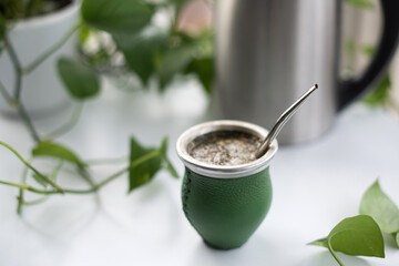 Yerba mate on white table