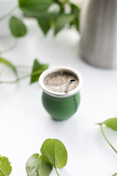 Yerba mate on white table