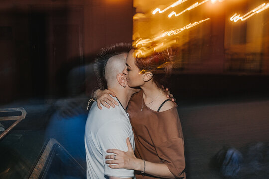 Hugs of a hipster couple in love