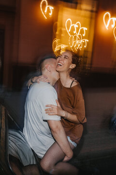Hugs of a hipster couple in love