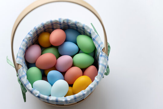 Colorful easter eggs in basket