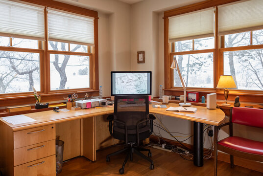 Modern Home office with wooden desk  