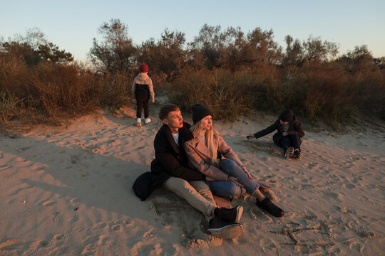 Family on the autumn beach 