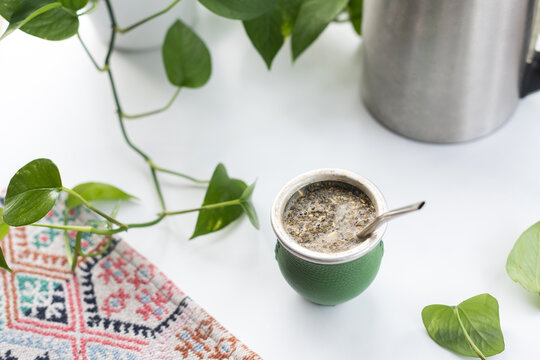 Yerba mate on white table