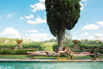 Diverse teens by a pool