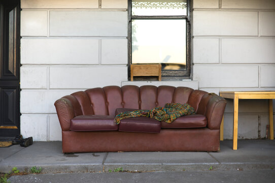 Old sofa on front porch