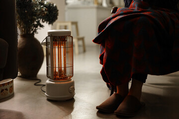 Closeup of heater in winter in cozy home environment