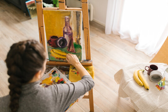 Anonymous artist painting on canvas