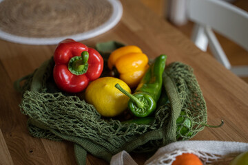 Vegetables and fruint in cloth bag in kitchen