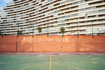 Shabby football playground in city