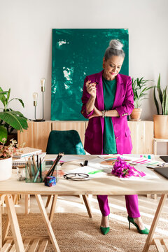 Senior fashion designer working in atelier