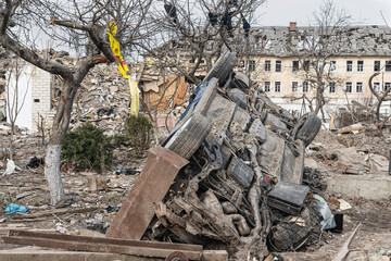 A civilian house and a car were destroyed after a rocket strike. Ukraine. Zhytomyr. (concept of war)