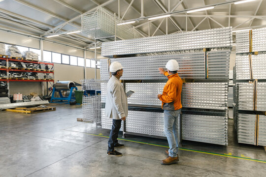 Workers Checking Aluminum Profiles