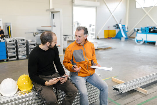 Workers Talking About Business