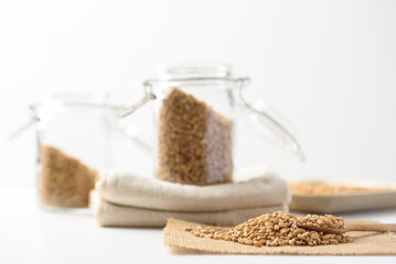 Whole wheat seedl on white background. Natural product, healthy baking ingredient