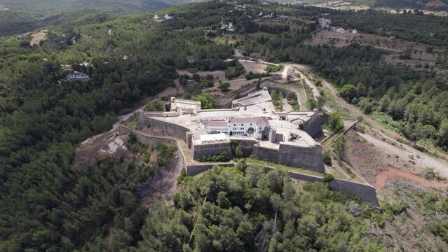 Star-shaped fortress with bastions and battlements, São Filipe Castle; aerial