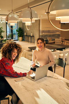 diverse coworkers laughing