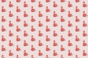 Creative pattern with ceramic figures of pink flamingos