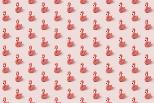 Creative pattern with ceramic figures of pink flamingos