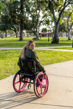 Woman with Physical Disability Sits in Park