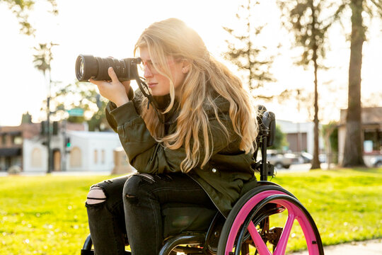 Woman in Wheelchair Takes a Photo