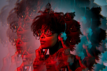 Woman listens to music in the recording studio