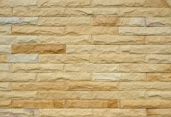 Sandstone wall used in background work.