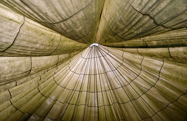 Close up of a large parachute as a big tent outdoors
